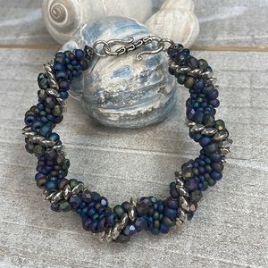 Silver disc  crocheted bracelet